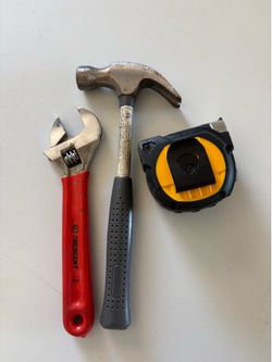 piece toolkit features a Crescent adjustable wrench with a distinct red handle.