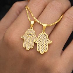 ✨ Elegant Hamsa Necklace – stylish and meaningful.