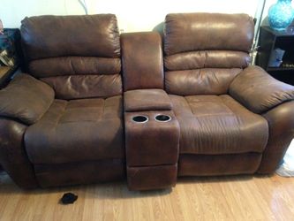 Two leather recliner seats