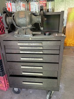 Workbench/sanding motor and a wood table to keep tools, different size of plastic jars w/ nails and screws … every drawer have tools .. All for $ 200.