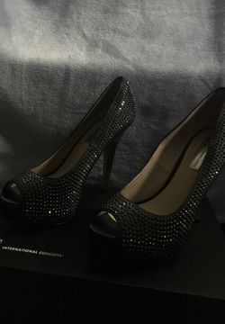 Black shiny studded heels