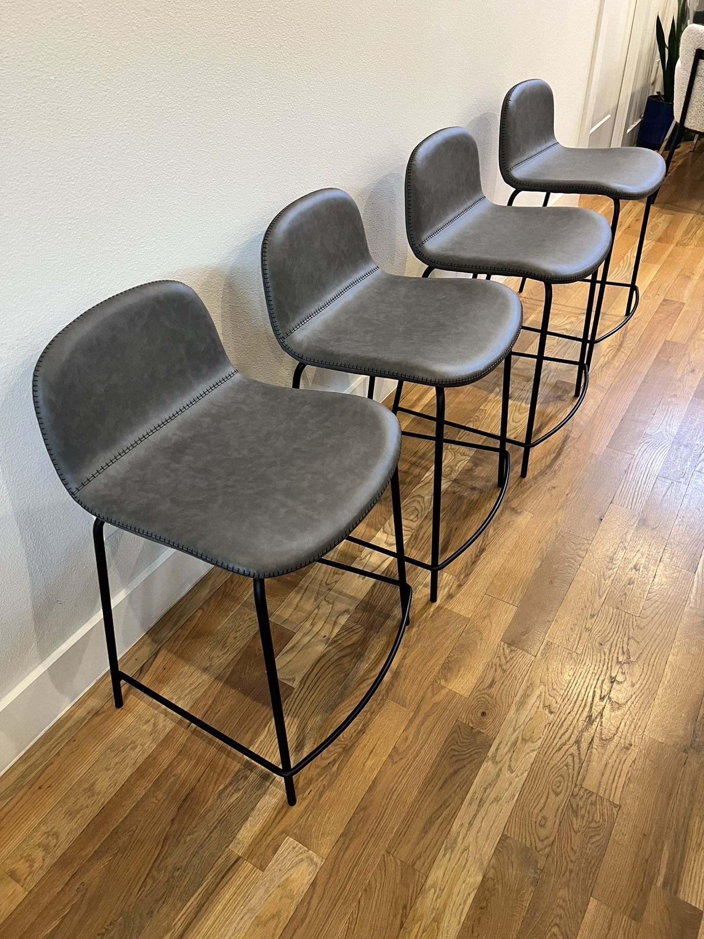 CB2 Gray Leather Stools