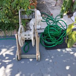 Hose Roller And 125ft Of Hose 