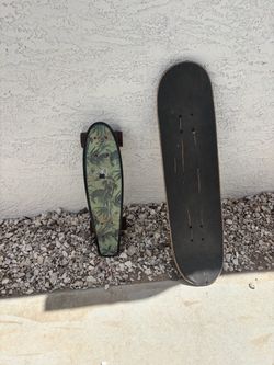 1 penny board 1 hart skateboard