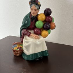 Royal Doulton Old Balloon Seller. 8” Tall