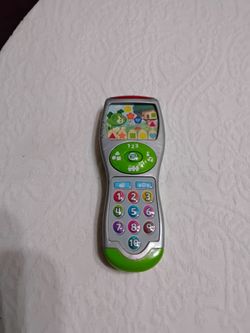 Leap Frog Scout's Learning Lights Remote.  Batteries Included