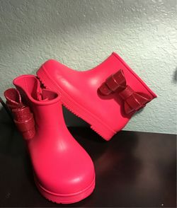 Mini Melissa pink bow rain boots