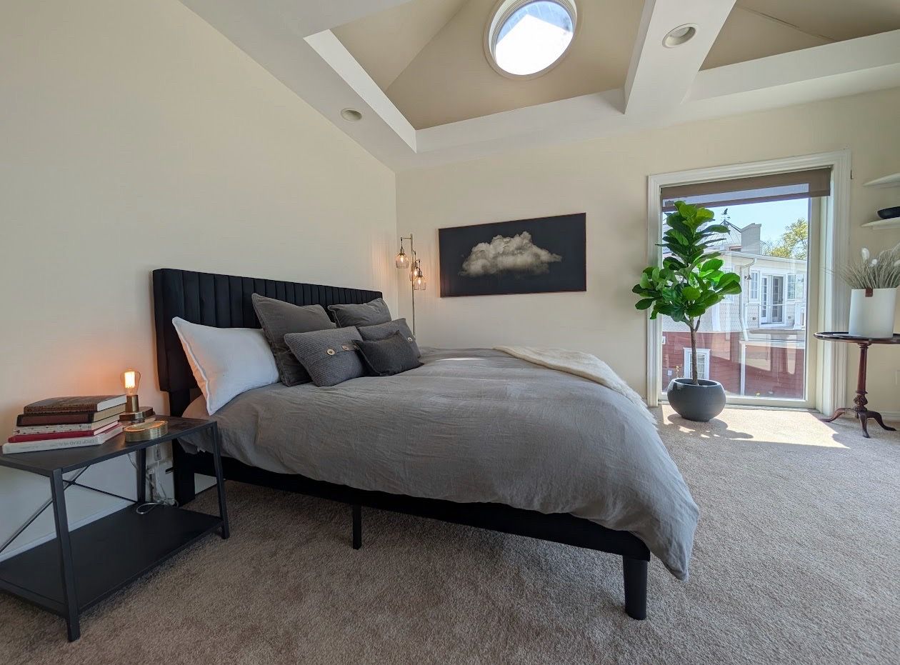 Black upholstered king bed frame
