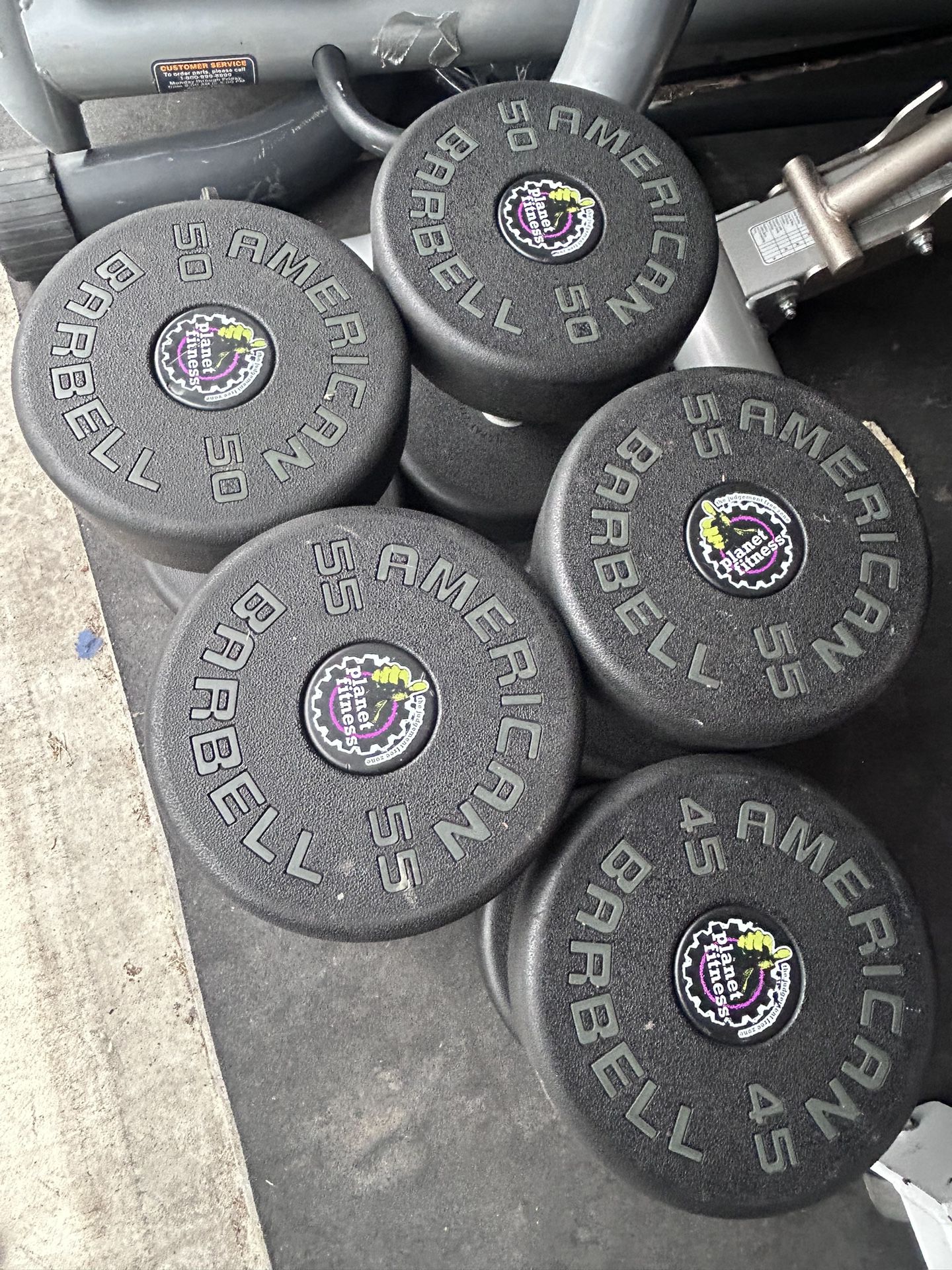 American Barbell Dumbbells 50s,55s & a single 45