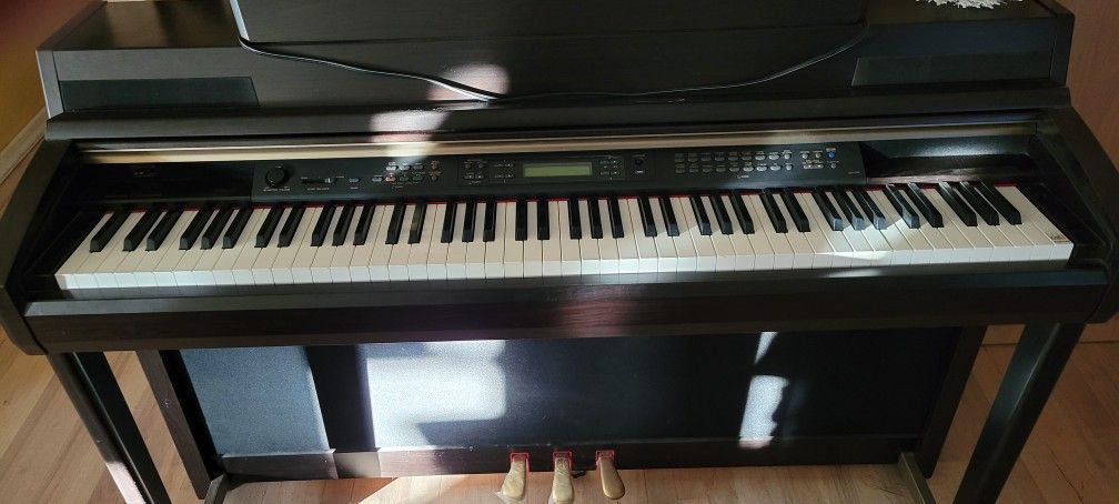 Yamaha Clarinova CLP-270 Digital Piano and Stool
