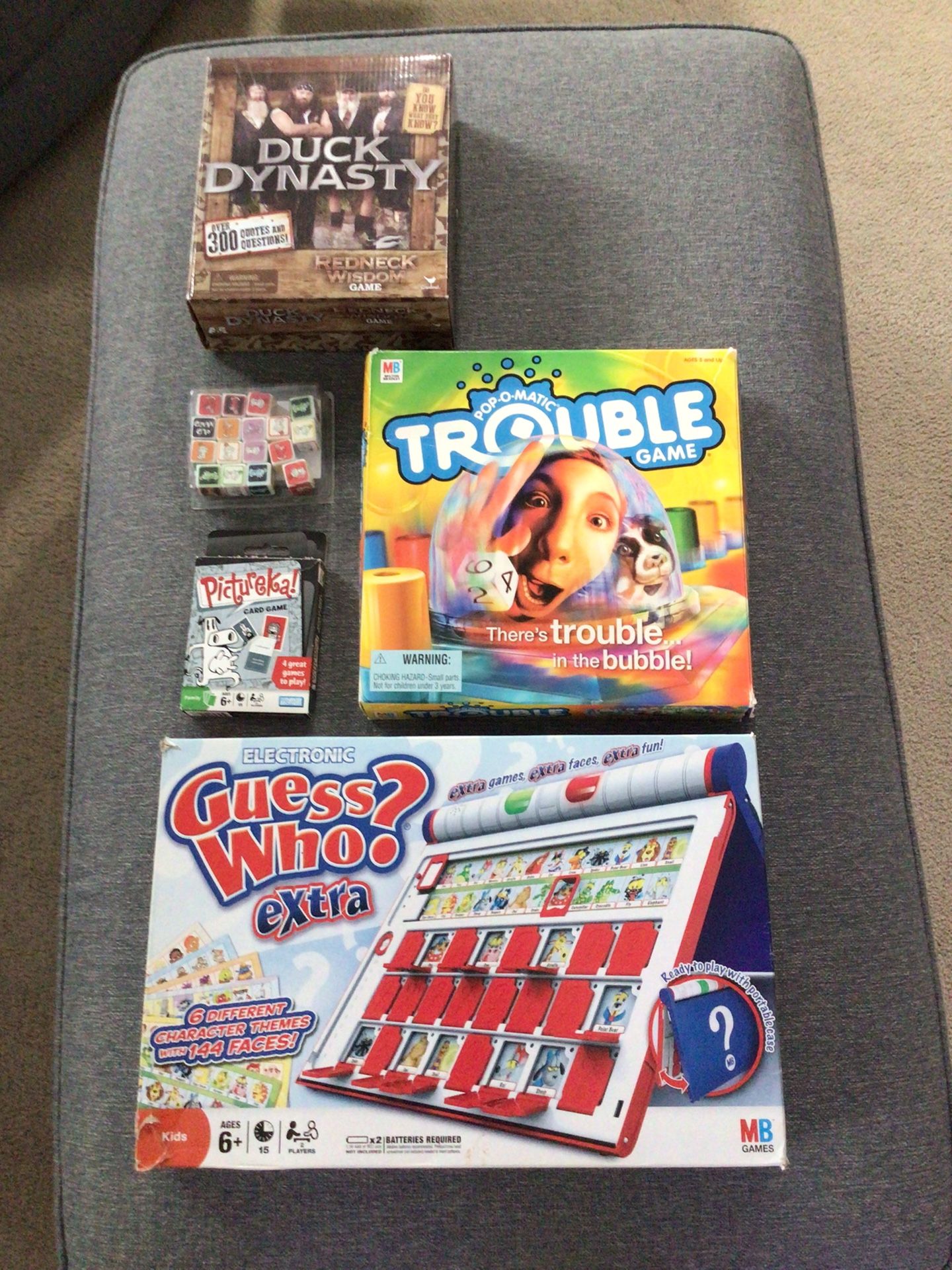 Lot of 4 Board Games Duck Dynasty, Trouble, Pictureka! Card Game, Old Maid Dice Game