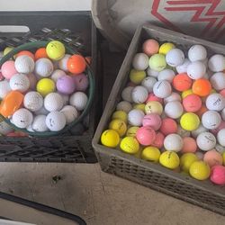 Two Crates Of Golf Balls