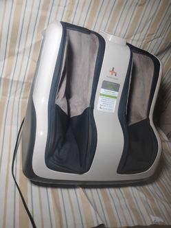 $50 HUMAN TOUCH FOOT AND CALF MASSAGER