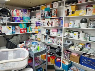 Baby Bottle Warmer,  Wipe Warmer,  Diaper Genie,  Baby Carrier,  & Diapers 