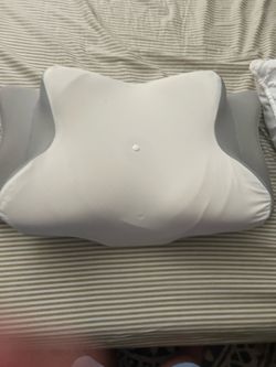 Ergonomic neck pillow