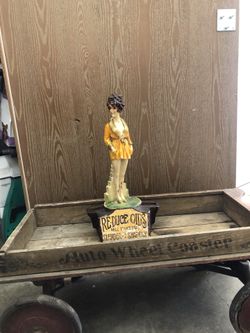 vintage "Reduce Oids" advertising statuette