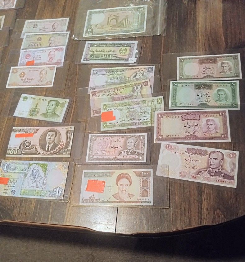Large UNC Currency Collection Featuring Portraits Of The World's Worst Dictators