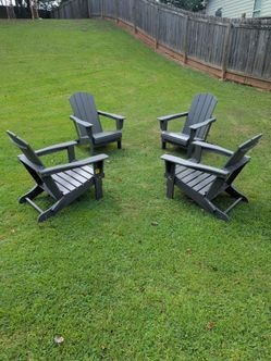 4 BRAND NEW Polywood HDPE material foldable gray Adirondack chairs just in