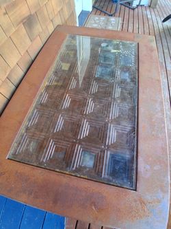 Artistic table, i believe (not sure) its framed copper