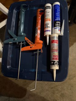 New Caulk Tubes & 2 Caulk Guns