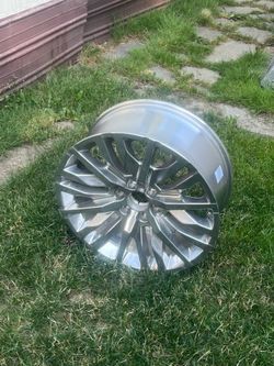 GMC rims 4 almost band new
