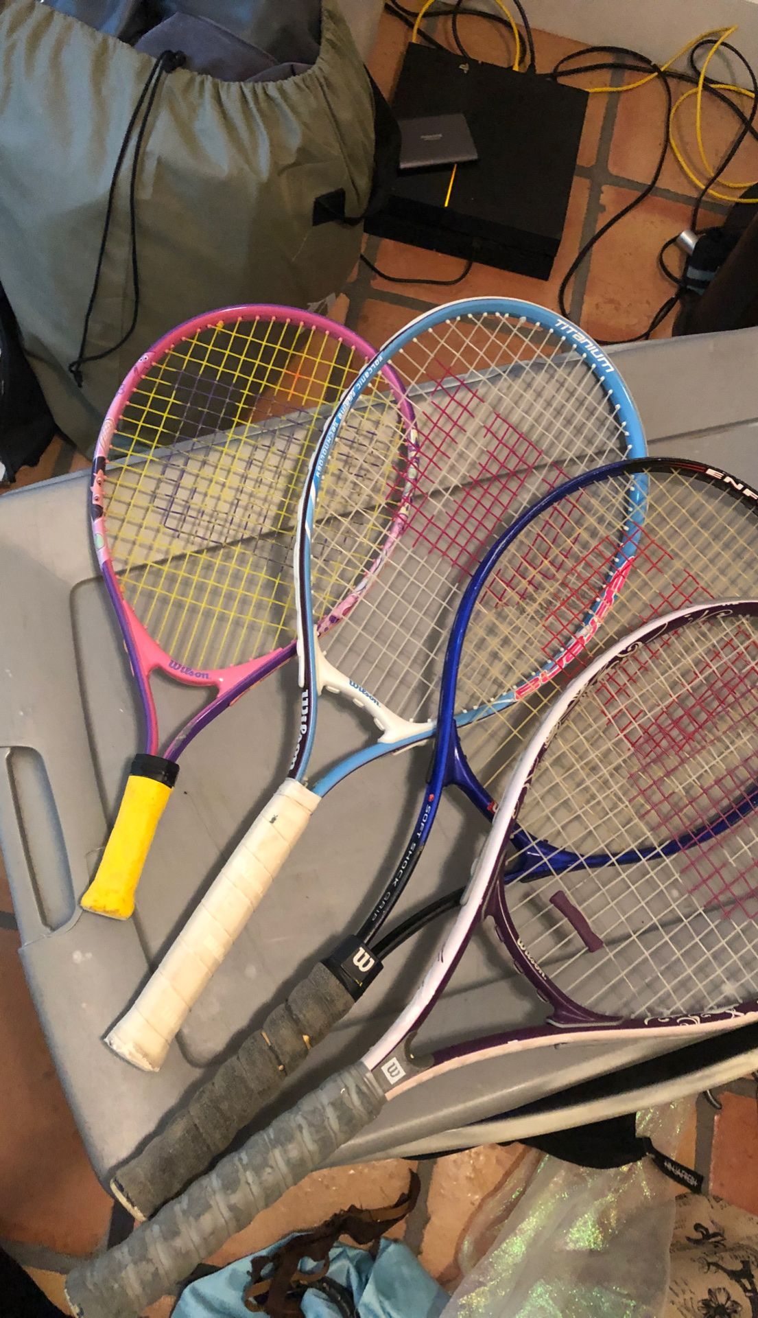 Lot of tennis rackets