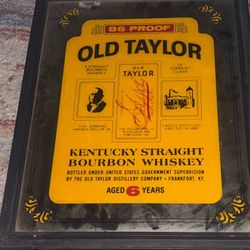 Antique old taylor whiskey sign 
