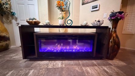 Beautiful modern fireplace /tv stand with 7 different colors 82” inches long