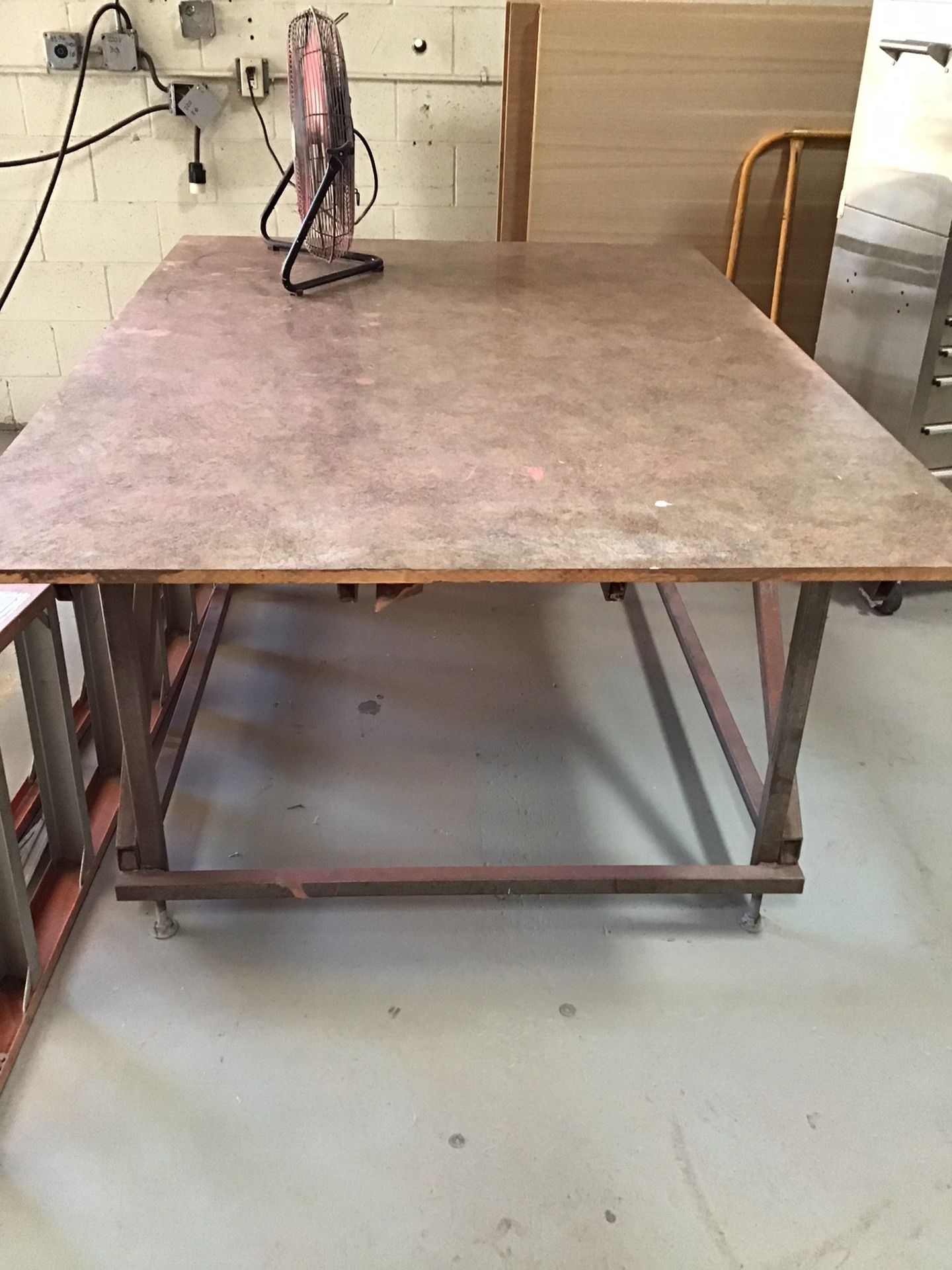 Steel working table with a laminate top - great for home project and shop work