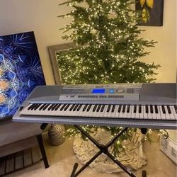 Yamaha Portable Grand 76-Key Electronic Music Keyboard with Portable Stand & Charger