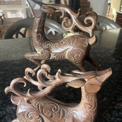 Carved wood deers