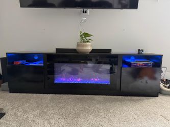 Black TV Stand with Electric Fireplace and LED Lighting