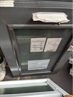 Bronze casement impact window 22 1/2 x 33 1/2