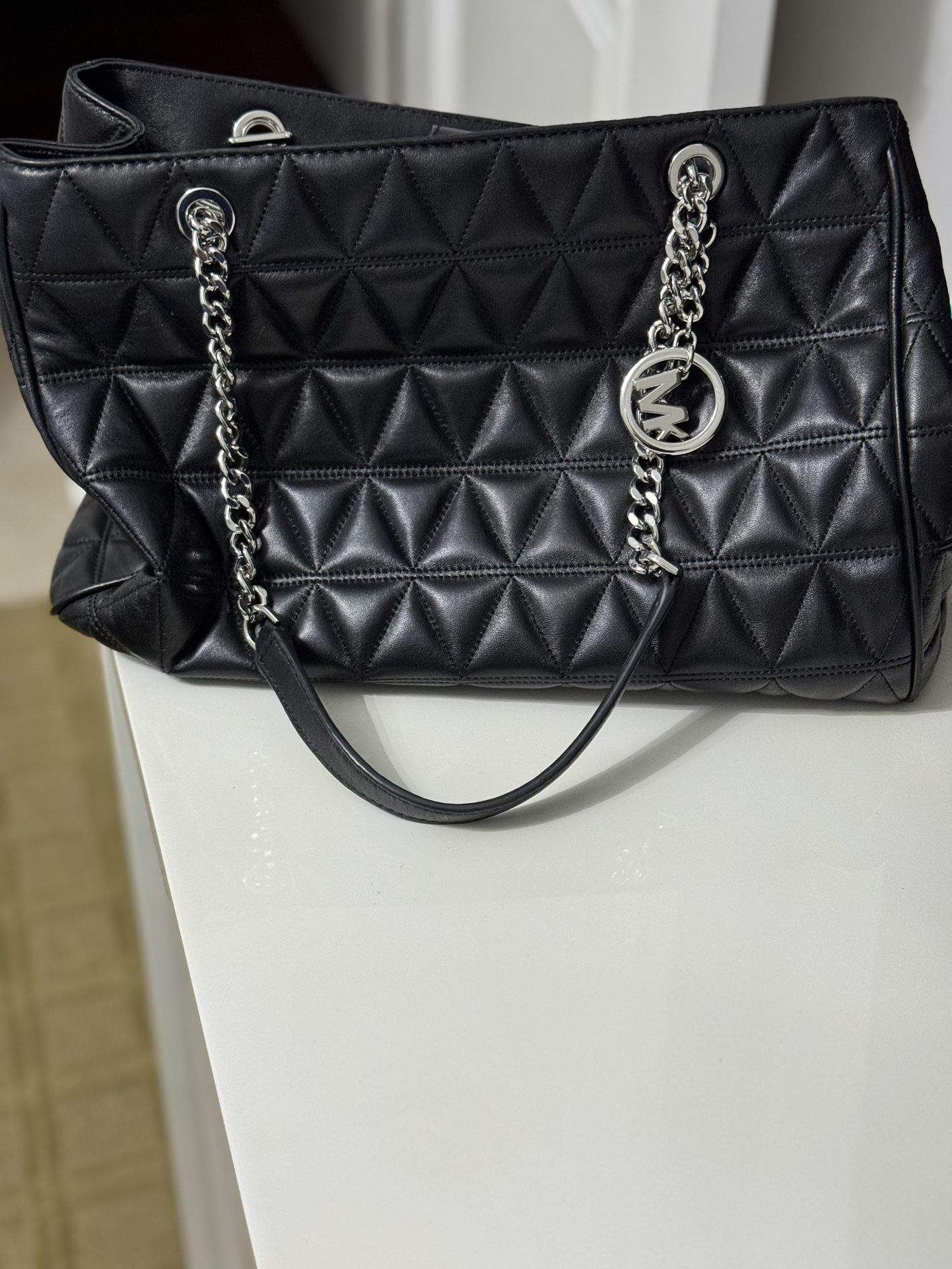 Black leather Michael Kors purse