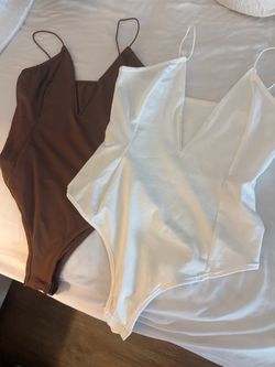 2 New woman body suit