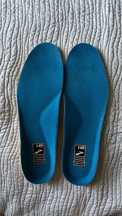 blue Brooks Addiction shoe insoles in a men's size 12