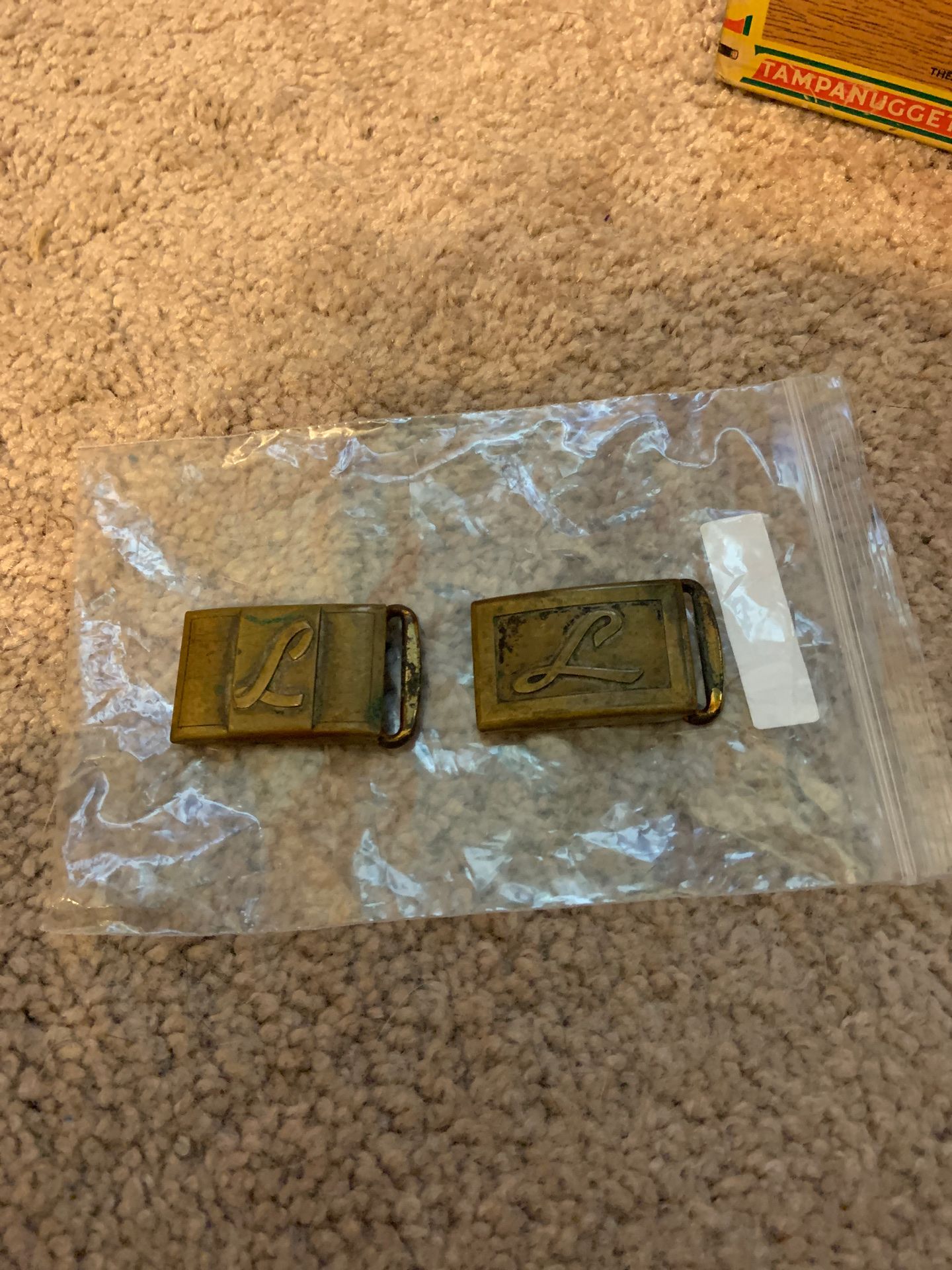 Two brass belt buckles