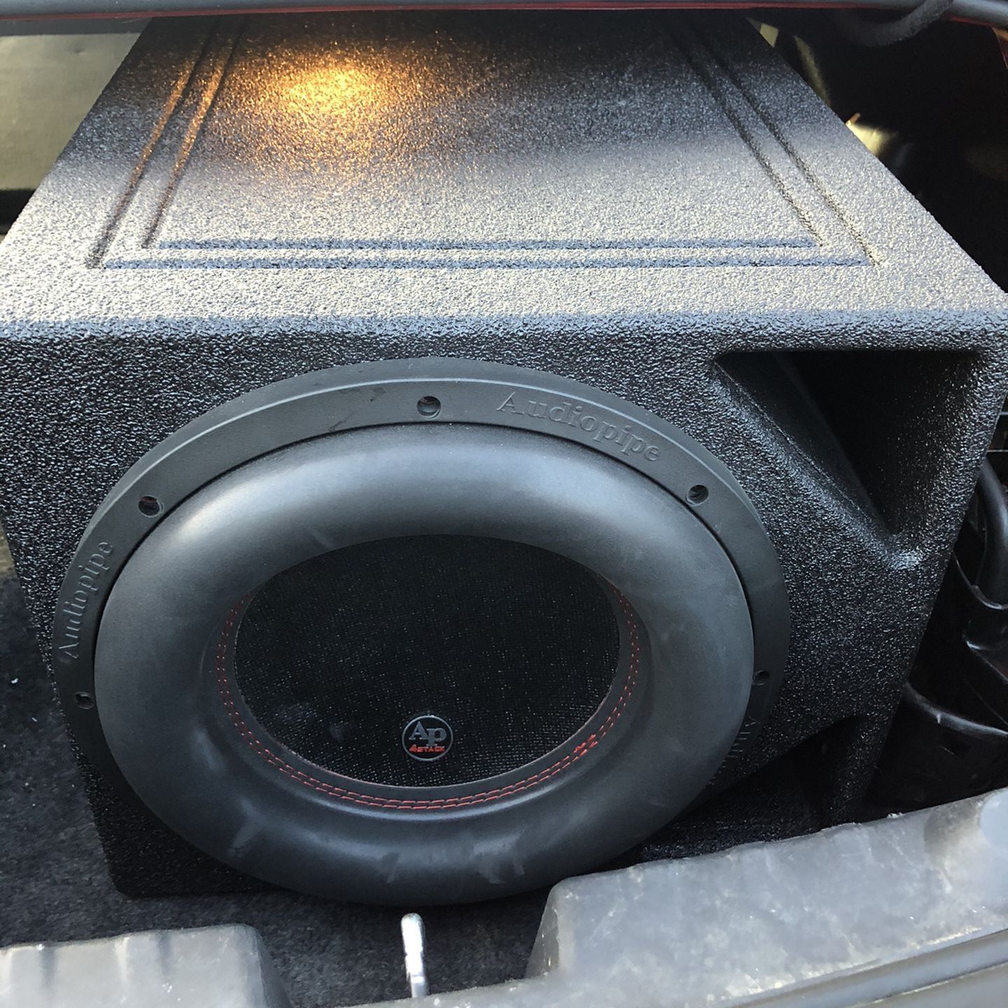 One 12inch audio pipe subwoofers with custom boss box , 1500watts amp