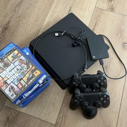 Sony PlayStation 4 Slim + Games + Accessories