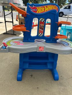 Hot wheels step 2 race track missing 2 pieces of track