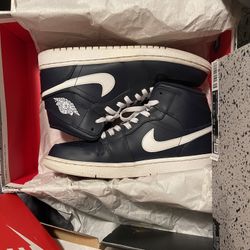 Obsidian/white Jordan 1s.  Authentic Size 9