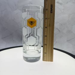 (1) Nice thick base Jack Daniel's Tennessee Honey Bee Highball Glass featuring an etched honeycomb pattern and a bee logo. 6 inches tall. Holds about 