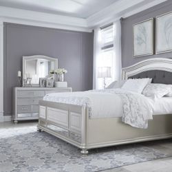 Coralayne Silver Upholstered Panel Bedroom Set


