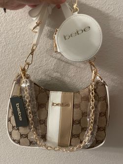 Bebe Brown And white signature handbag