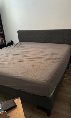 Dark gray fabric California king sized bed frame includes with memory foam mattress