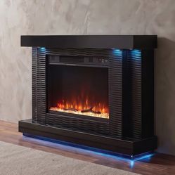 Black fireplace with remote control brand new in box firm price $730