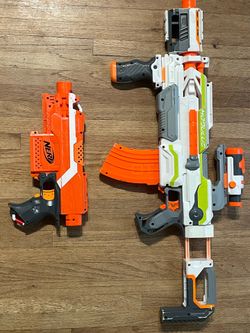 Two semi automatic nerf blasters