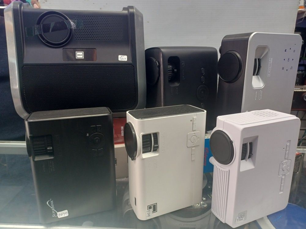 Quality Projectors By Rca $40. With Screen $59. With Roku Stick Smart $89