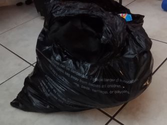 Trash bag of new hot wheels