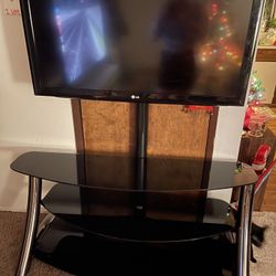 Entertainment Stand With Swivel Tv Mount, Includes Working 42 Inch LG Tv